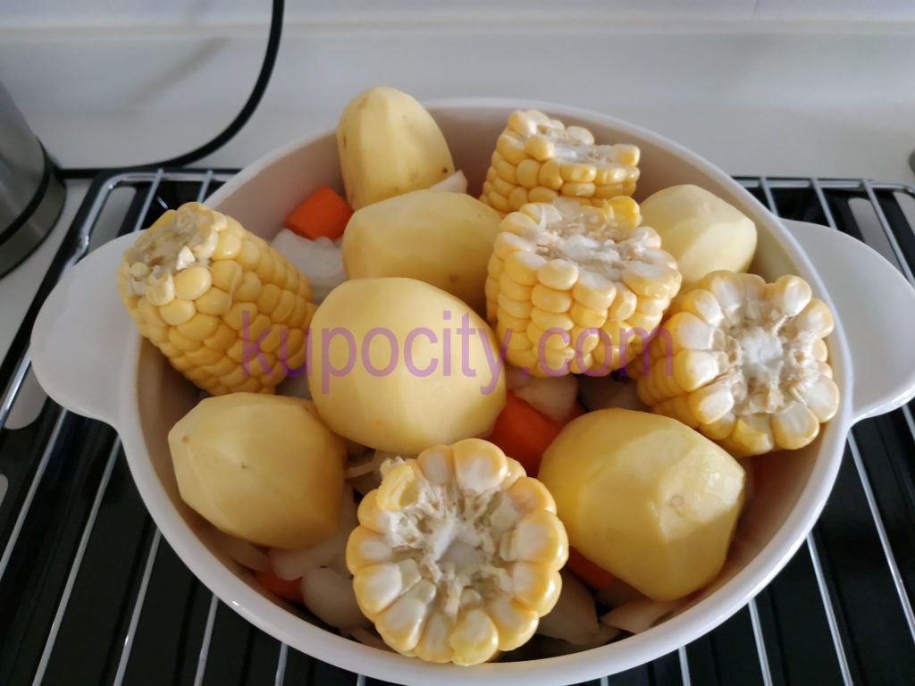 Place corn and potato on top.