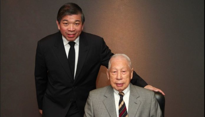 Chang Yun Chung (right), founder of Pacific International Lines (PIL), with his son Teo Siong Seng (left)