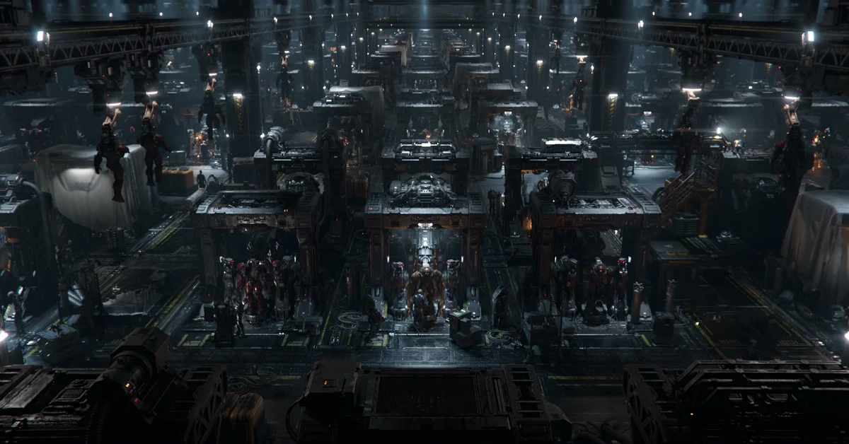 Rows of Dominion mech suits and marines lined up in a massive hangar bay in the StarCraft Dominion cinematic